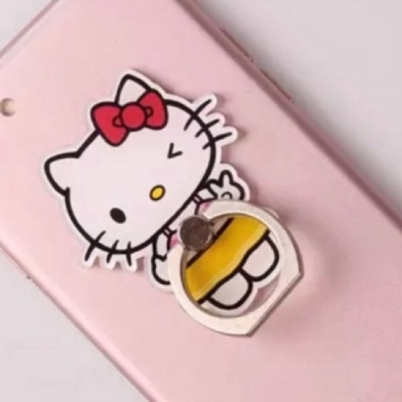 NWT Hello Kitty Yellow Dress Metal Phone Ring Grip - Picture 1 of 2